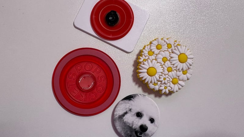 Bianca's collection of swappable PopGrip tops