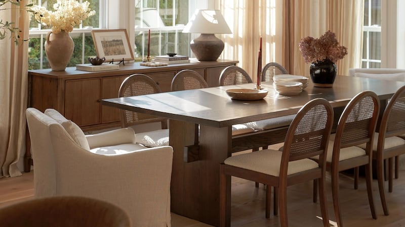 a dining table with chairs around it