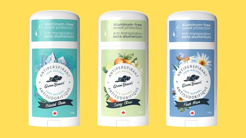 three deodorants lined up with a bright background