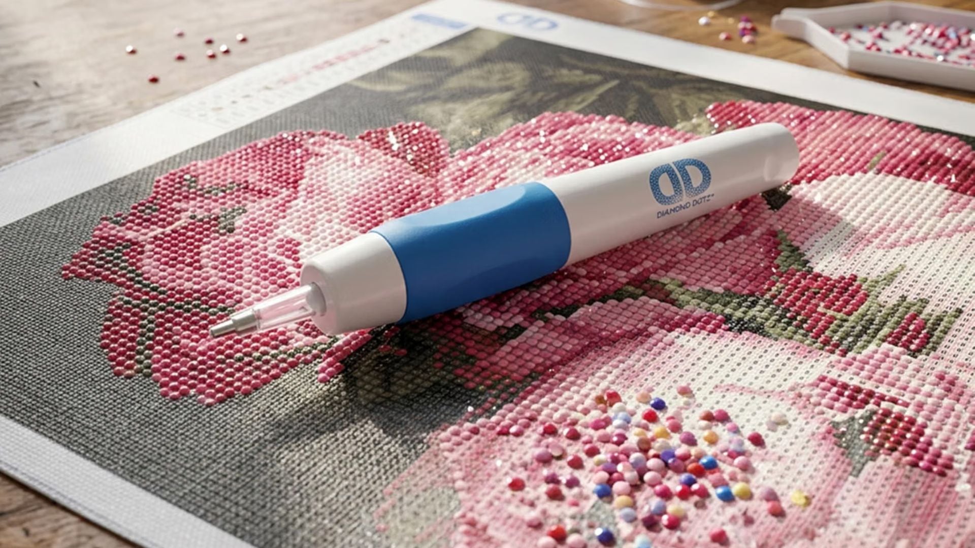A Diamond Dotz stylus on a diamond art project.