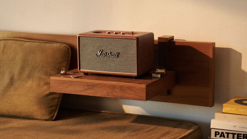 The Acton III speaker on a bedside table.