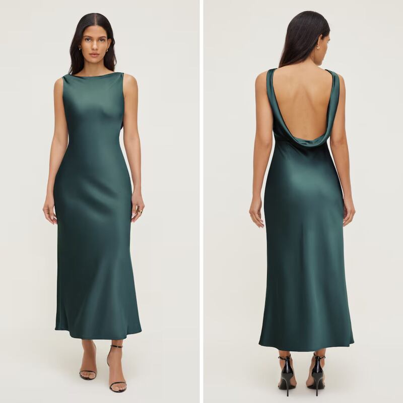 A person wearing a green Dynamite dress.