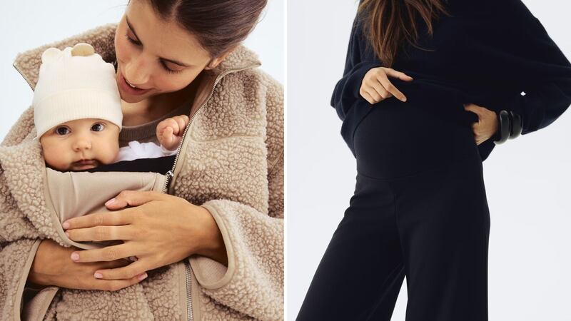 A person wearing a sherpa jacket with a baby inside and a person wearing maternity trousers.