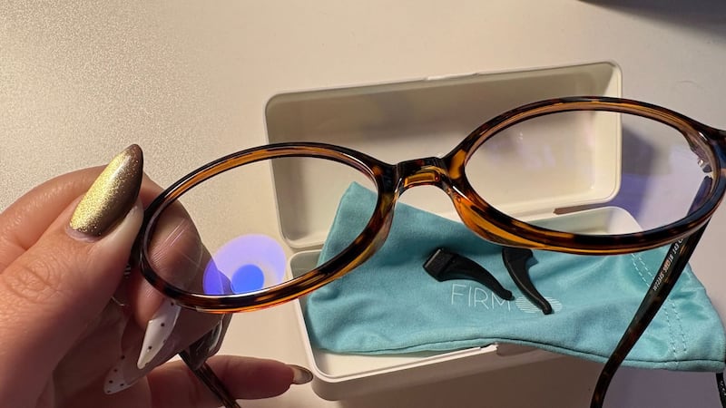 Bianca demonstrating the blue glare in the lens