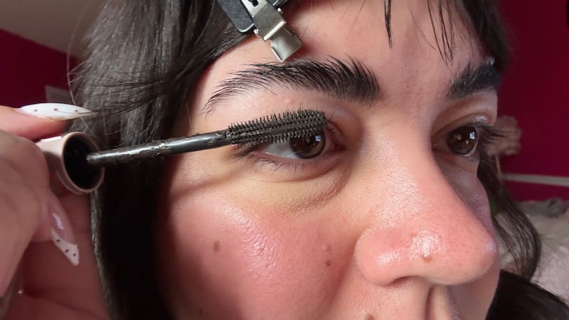 Bianca applying the Maybelline Lash Sensational Body Mascara to her eyelashes