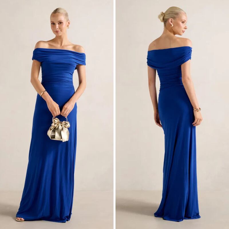 A person wearing a cerulean ballgown from Ever New.