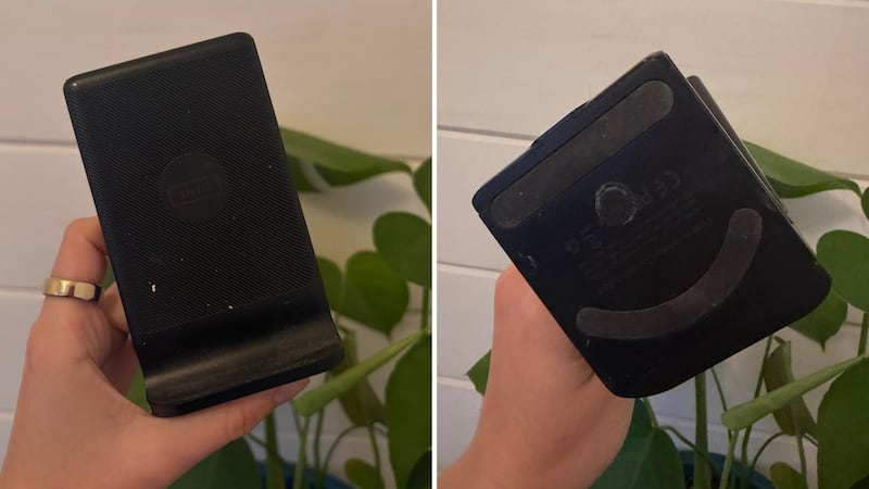 Alice showing the front and bottom of the INIU Phone Charging Dock.