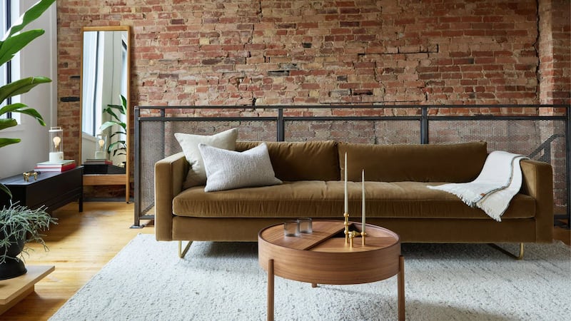 a couch in a loft living room