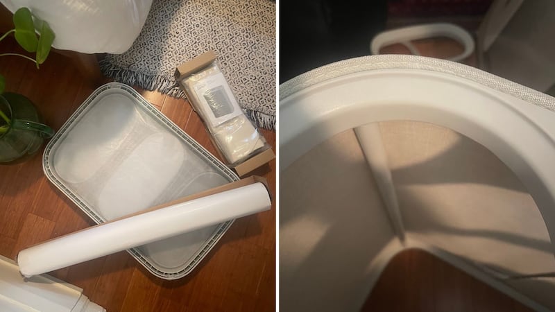 Putting the Joseph Joseph laundry hamper together.