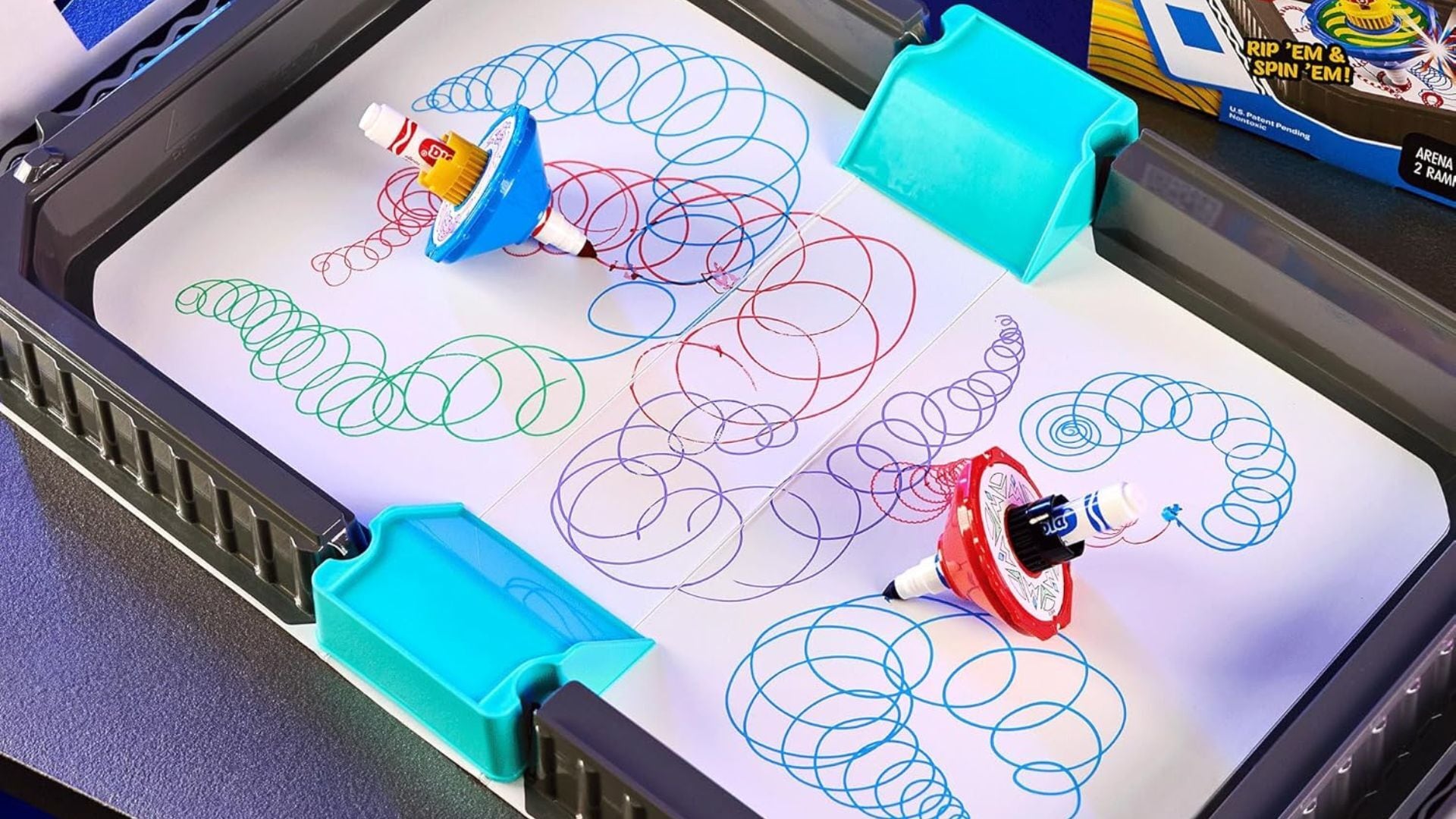 a Crayola Colourwhirls arena with swirls on it