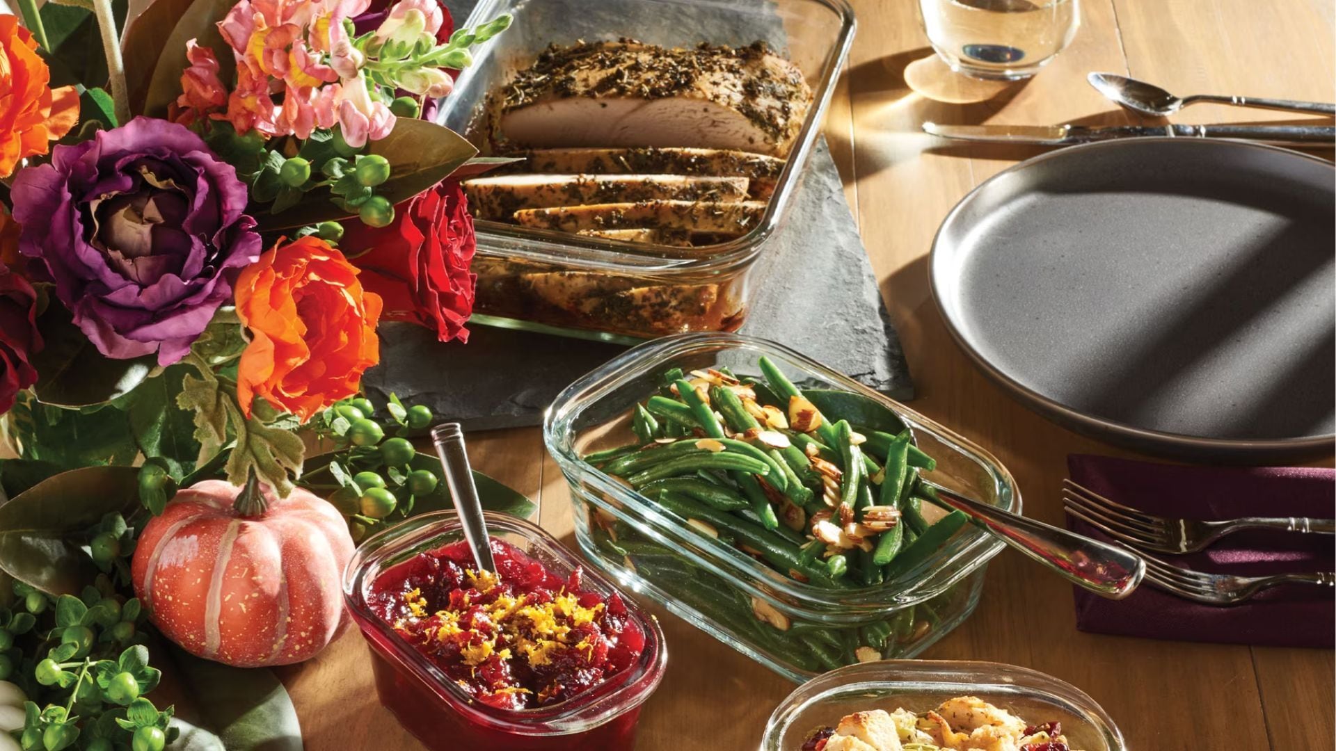 a dinner put away in glass storage containers on a kitchen counter