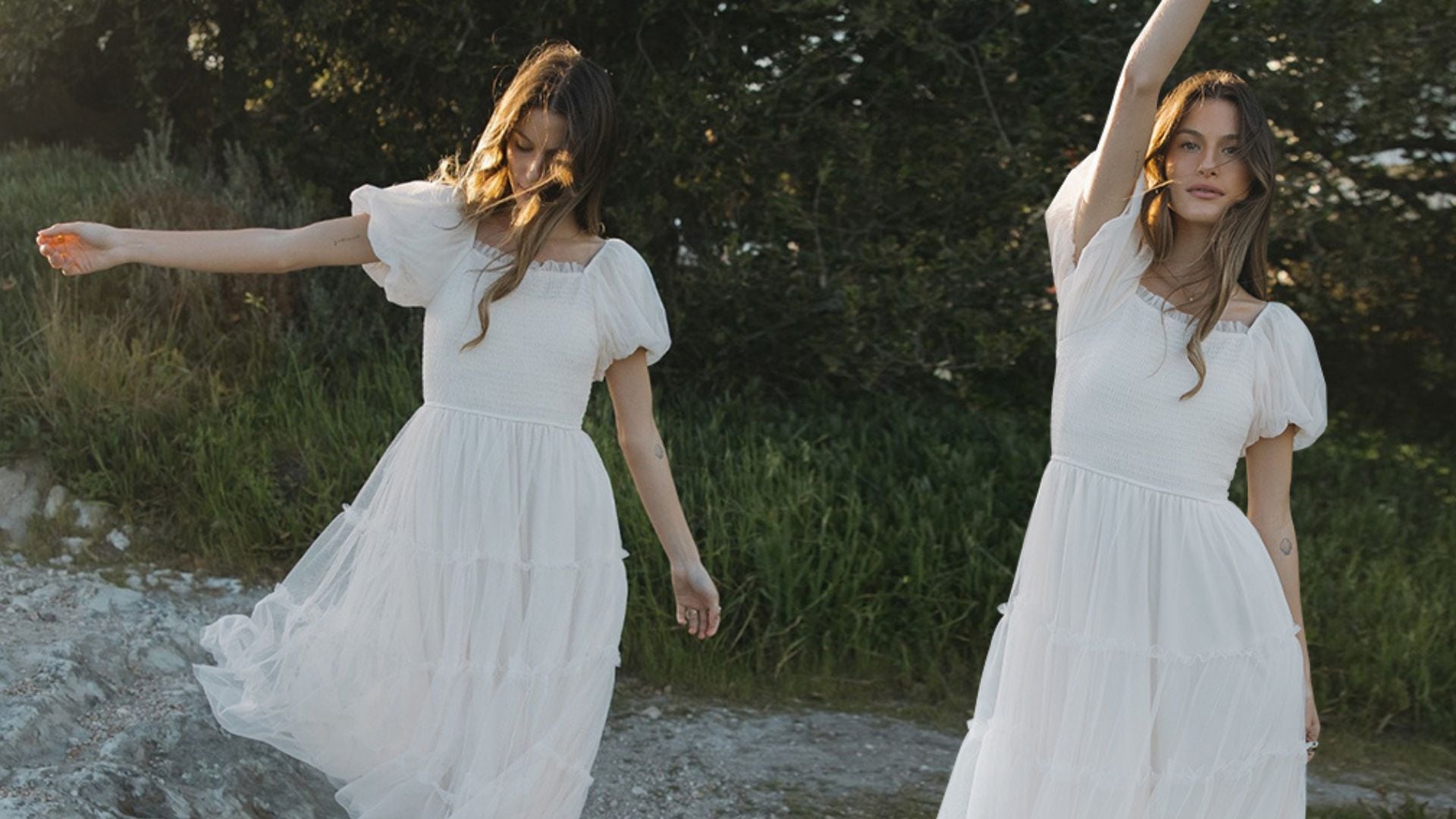 a model twirling in a dress in a field