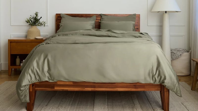 Silk & Snow sheets on a bed.