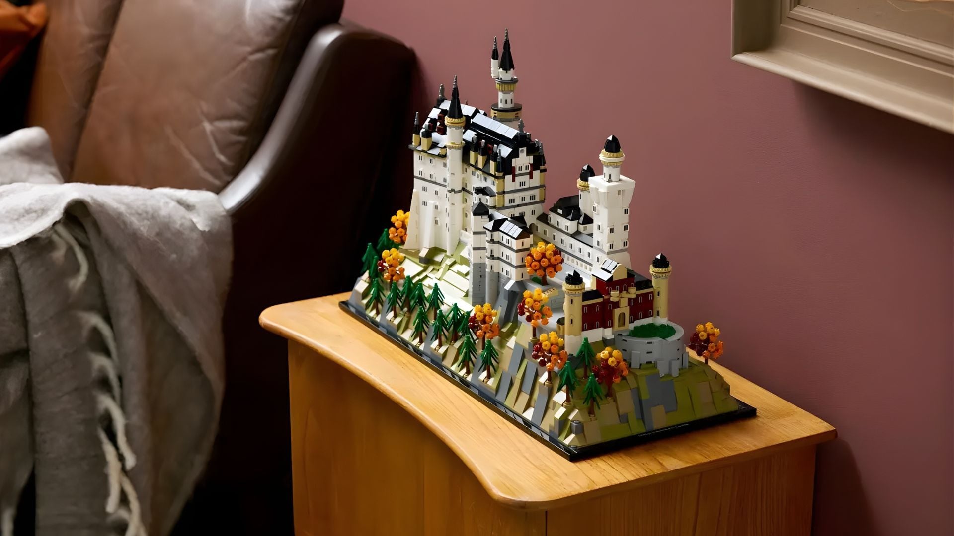 a castle lego set on a table in a living room