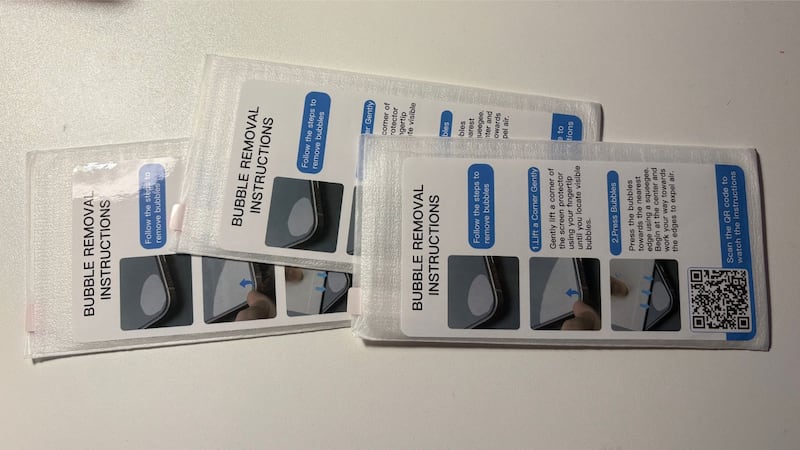 The three protectors in their protective sleeves with troubleshooting instructions on the front