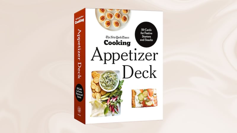 The New York Times Cooking Appetizer Deck: 50 Cards for Festive Starters and Snacks on a swirly background.