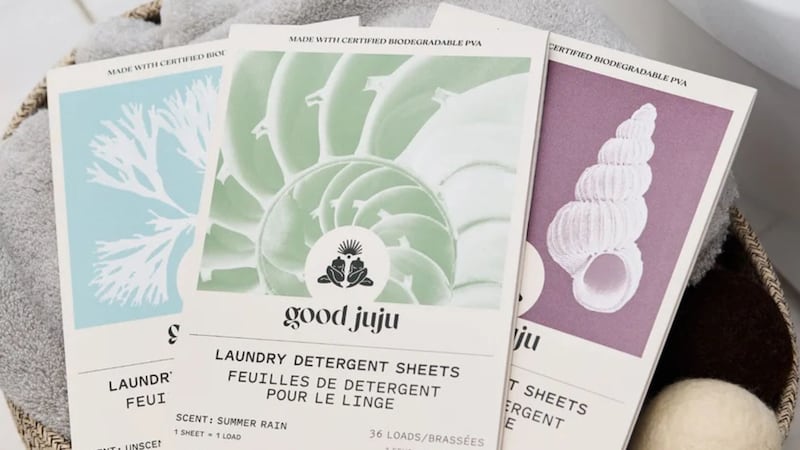 Three packs of Good Juju detergent strips.