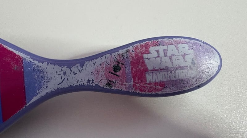 The decorative design fading off of Bianca's Star Wars Wet Brush
