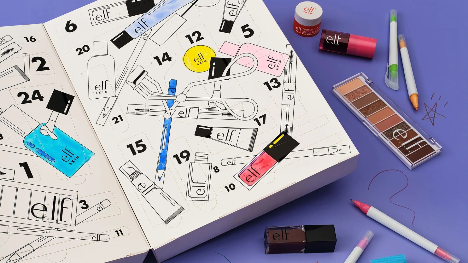 The e.l.f. Advent Calendar surrounded by beauty products.