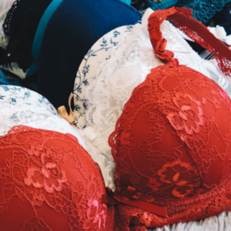 lace bras of different colours in a row
