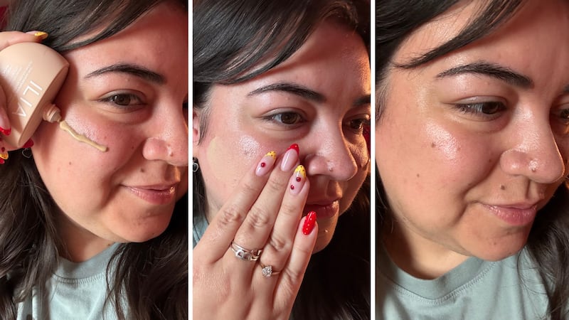 Bianca applying the sunscreen to her face and blending it in