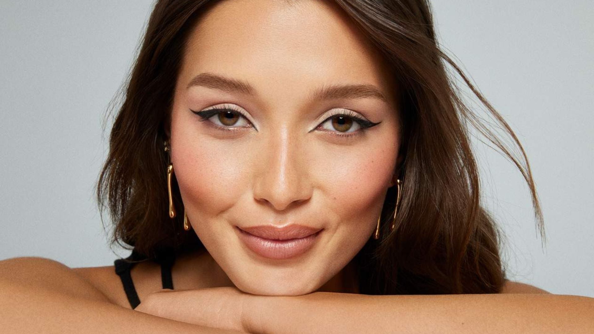 a model with a winged eyeliner