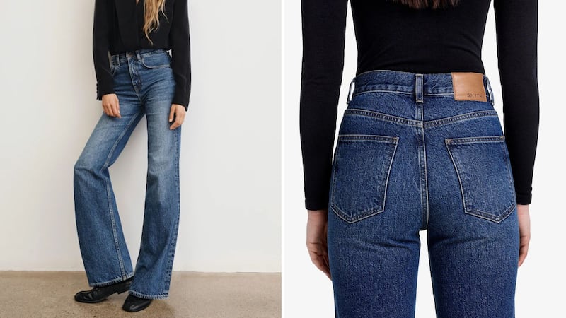 A model wearing SMYTHE Owl High Rise Boot Cut Jean.