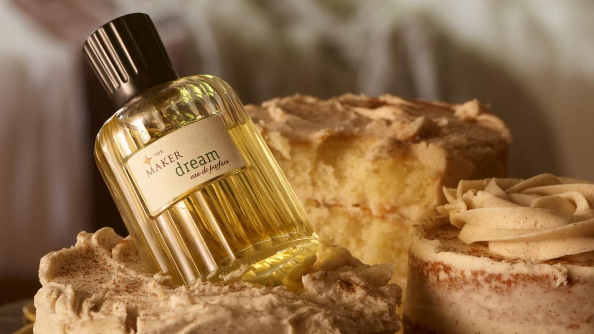 A bottle of perfume on a cake.