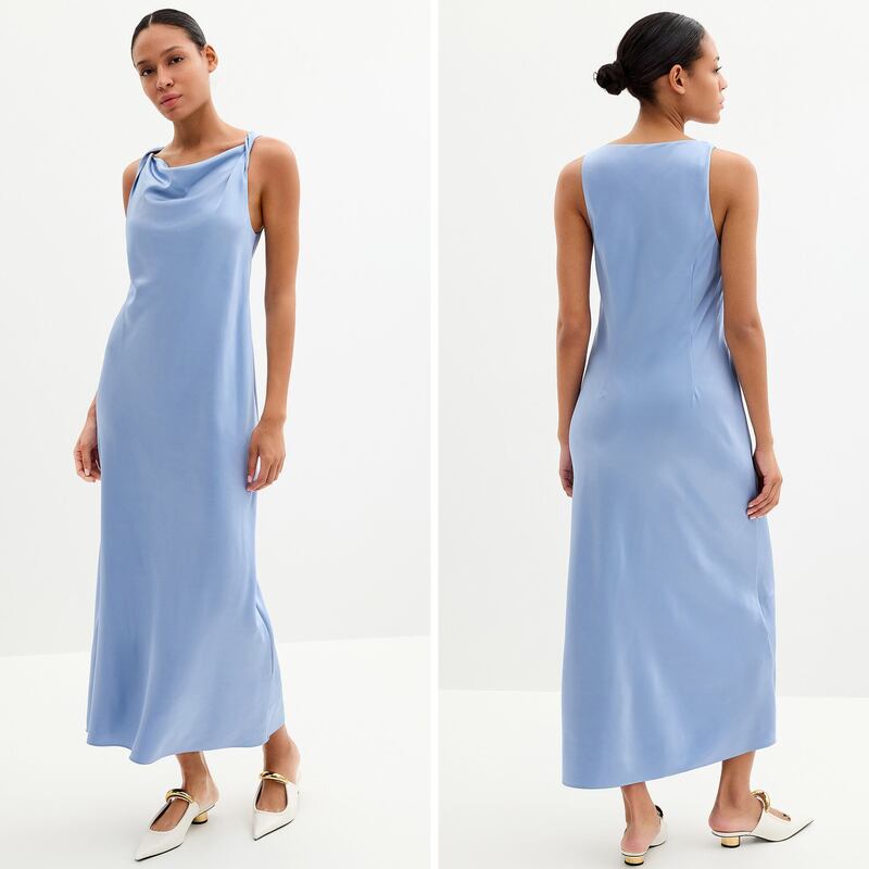 A person wearing a light blue bridesmaid dress from Simons.