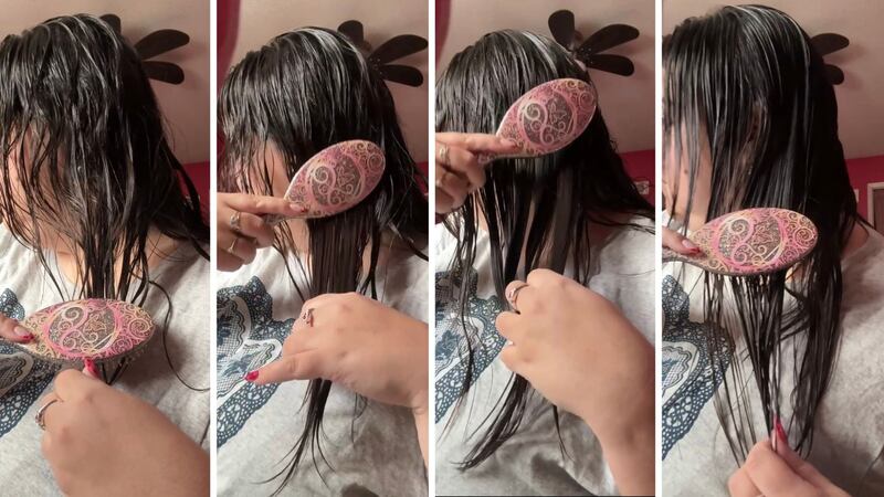 Bianca demonstrating brushing her hair from the ends to the root, finishing with smooth, tangle-free hair