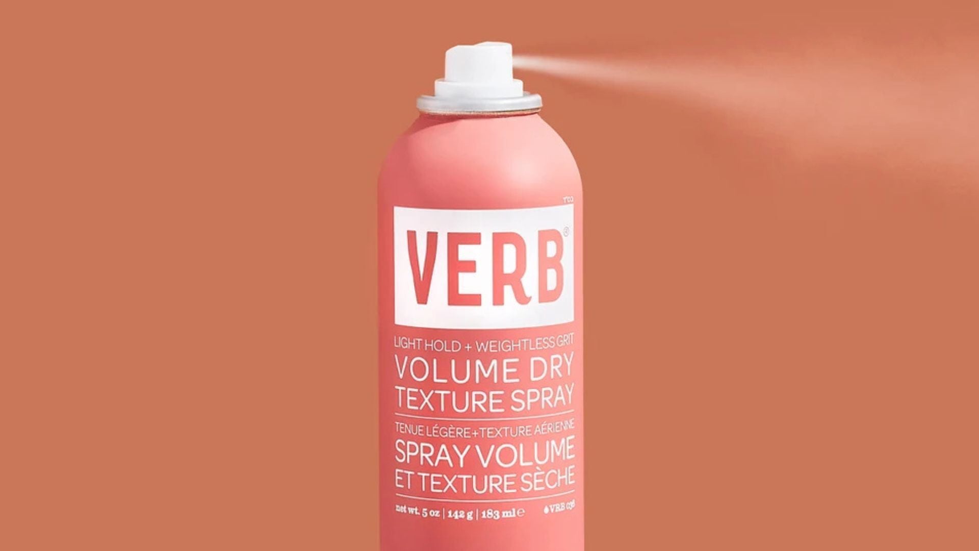 a Verb texture spray spraying with a bright background